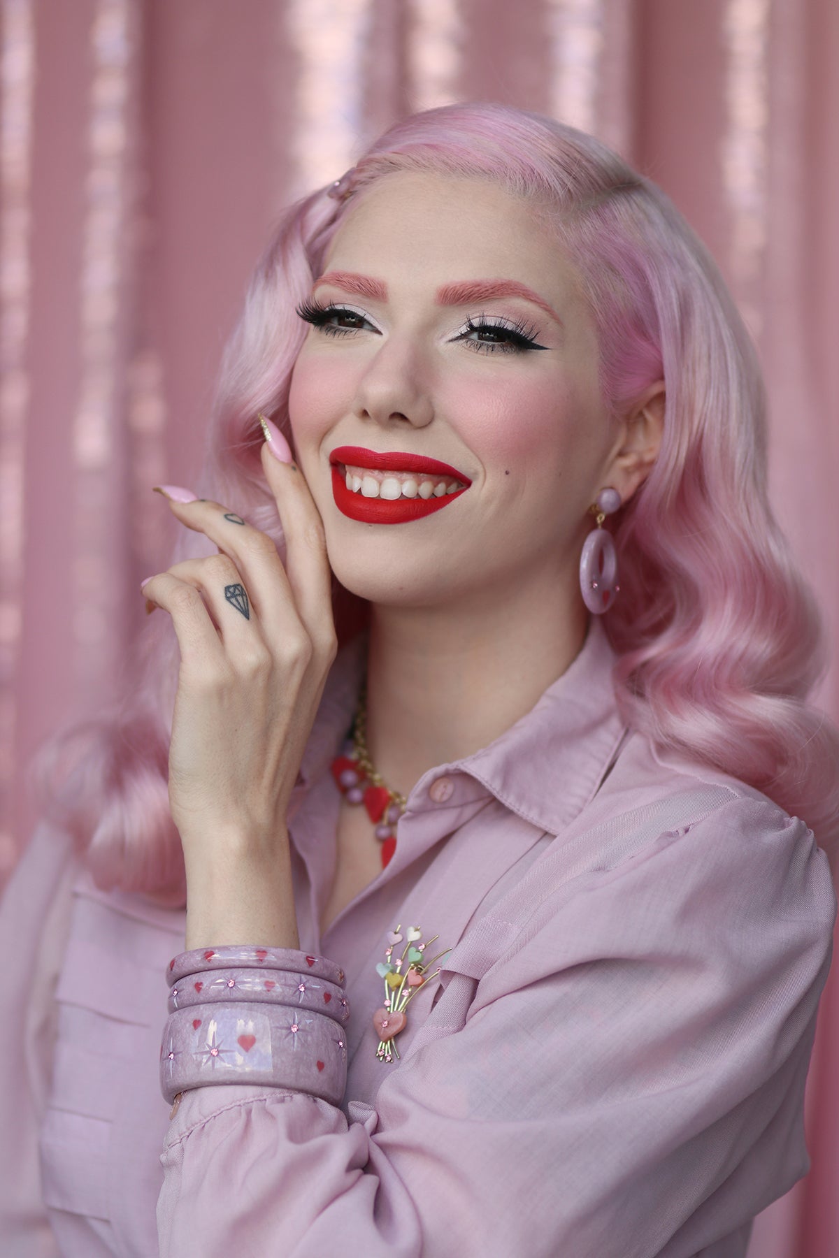 Splendette vintage inspired 1950s Valentine's style pastel purple Poppet jewellery worn by pin up model Dafna Bar-El