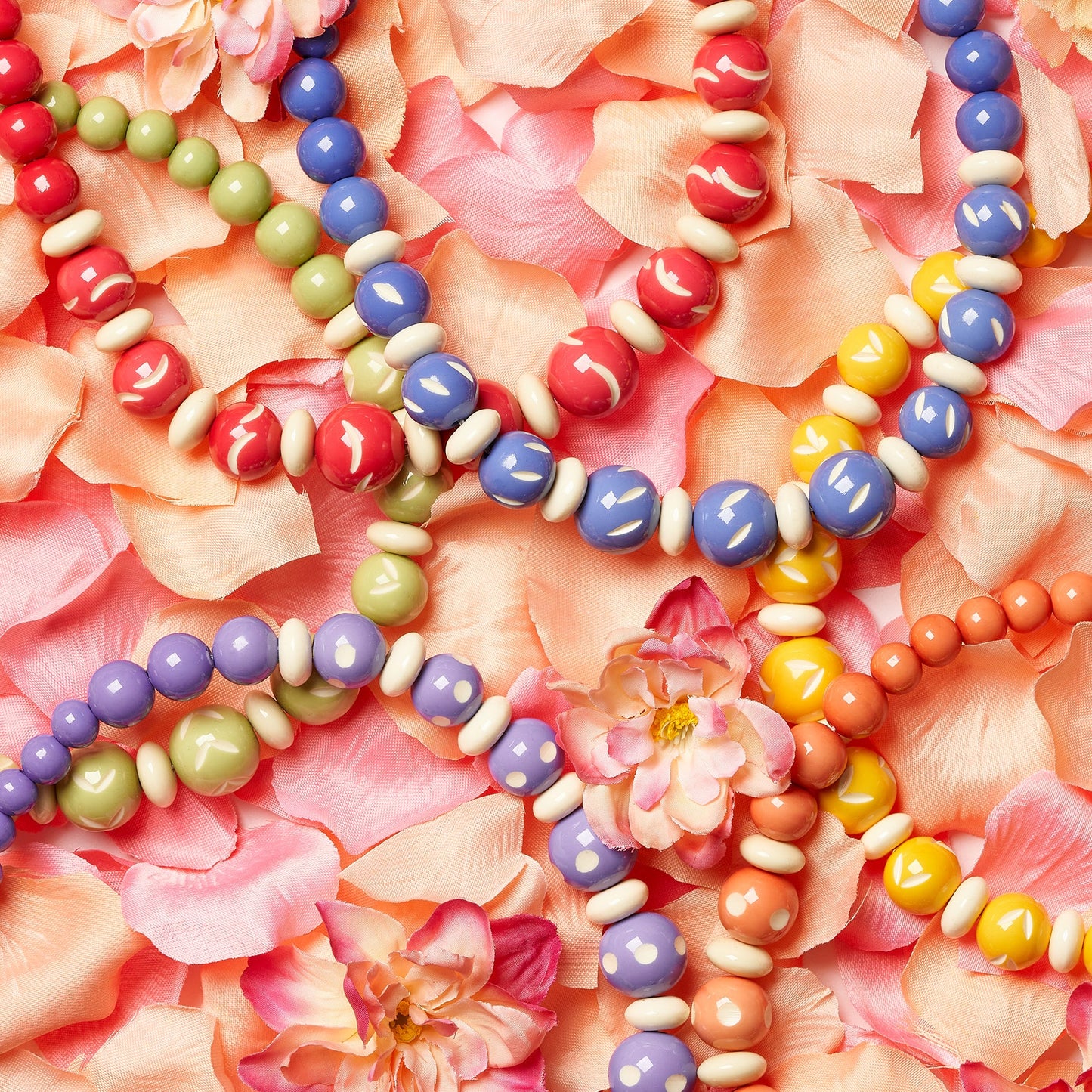 Splendette vintage inspired 1940s style carved pastel fakelite Bead Necklaces flat lay