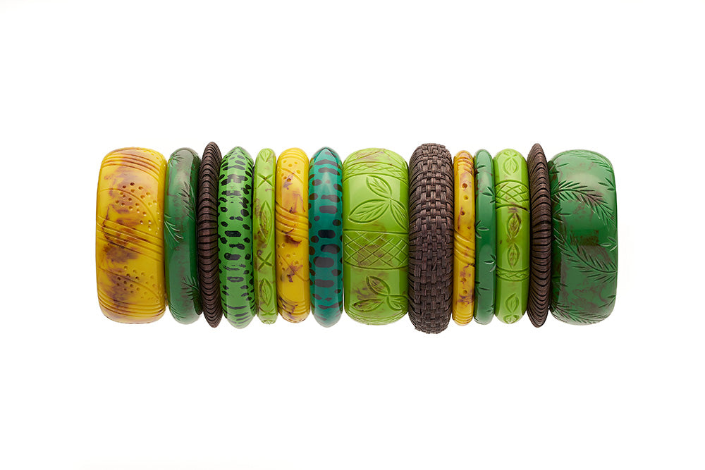 Stack of bakelite style bangles in leopard catkin alder and dark woven