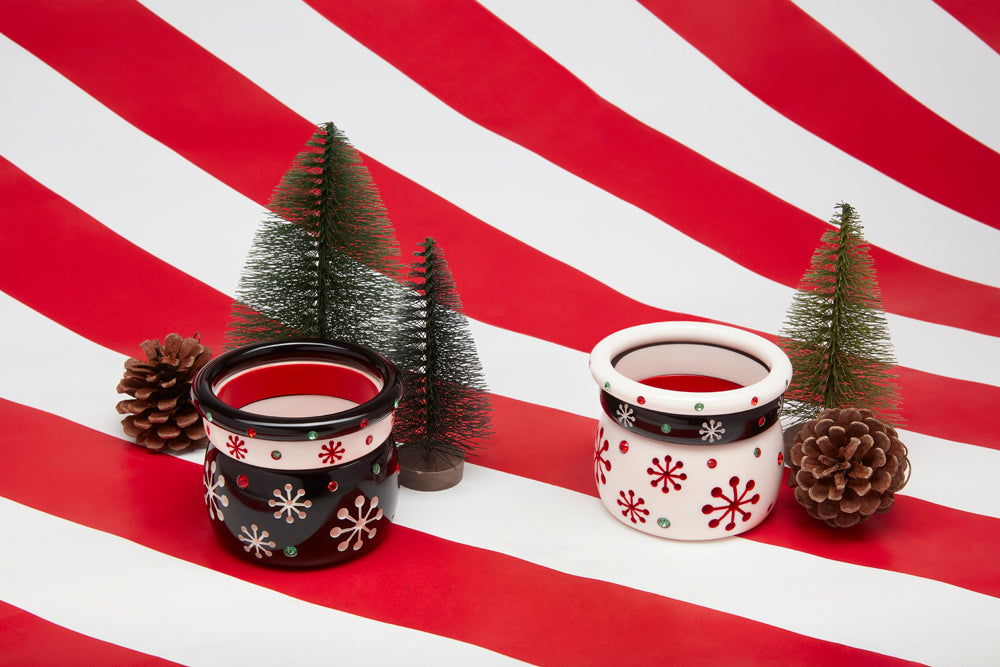Splendette vintage inspired 1950s Christmas style jewellery, black Musta and white Lumi Atomic Snowflake Bangle stacks