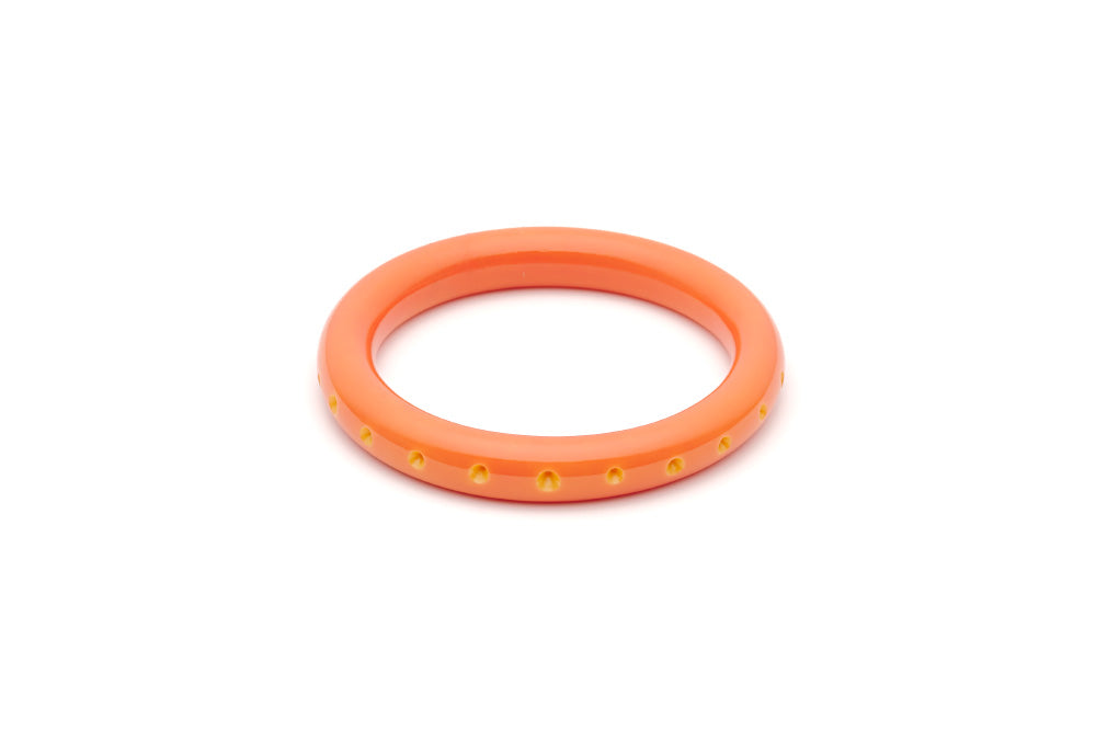 Splendette vintage inspired 1950s Bakelite style peachy orange Duotone fakelite Narrow Freesia Carved Bangle in Maiden size