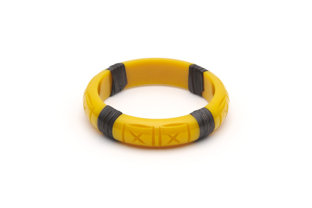 Splendette vintage inspired 1940s 1950s tropical style carved yellow fakelite Midi Ochre Dark Cane Bangle in Classic size.
