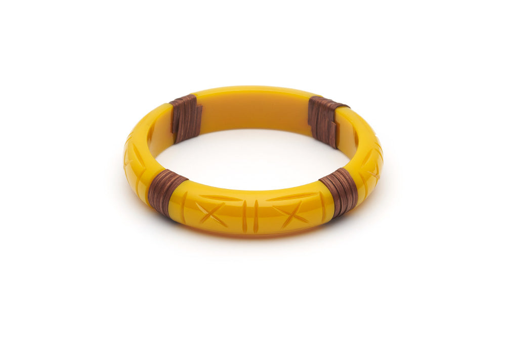 Splendette vintage inspired 1940s 1950s tropical style carved yellow fakelite Midi Ochre Mid Cane Bangle in larger Duchess size.