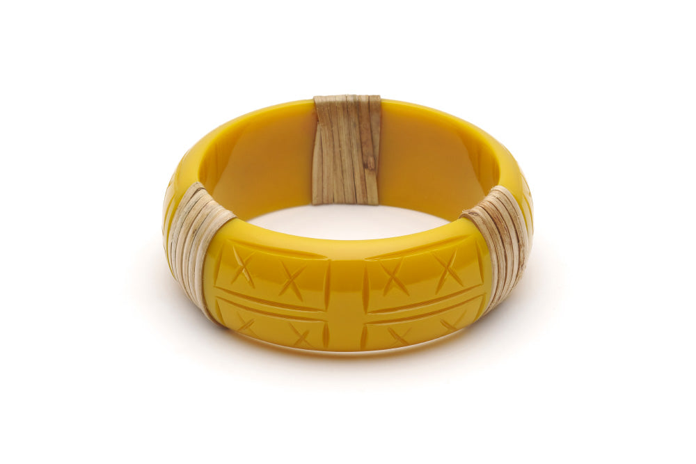 Splendette vintage inspired 1940s 1950s tropical style carved yellow fakelite Wide Ochre Light Cane Bangle in larger Duchess size.
