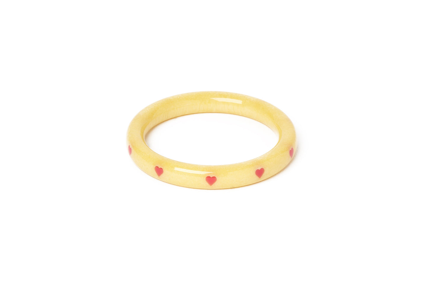 Splendette vintage inspired 1950s kitsch Valentine's style pastel yellow carved fakelite smaller size Narrow Honey Bunch Starburst Maiden Bangle