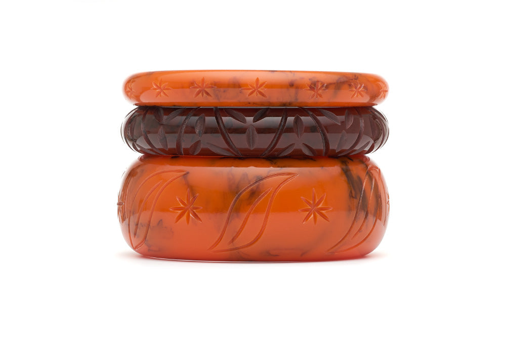 Stack of 1940s style duchess bangles in fox and mouse