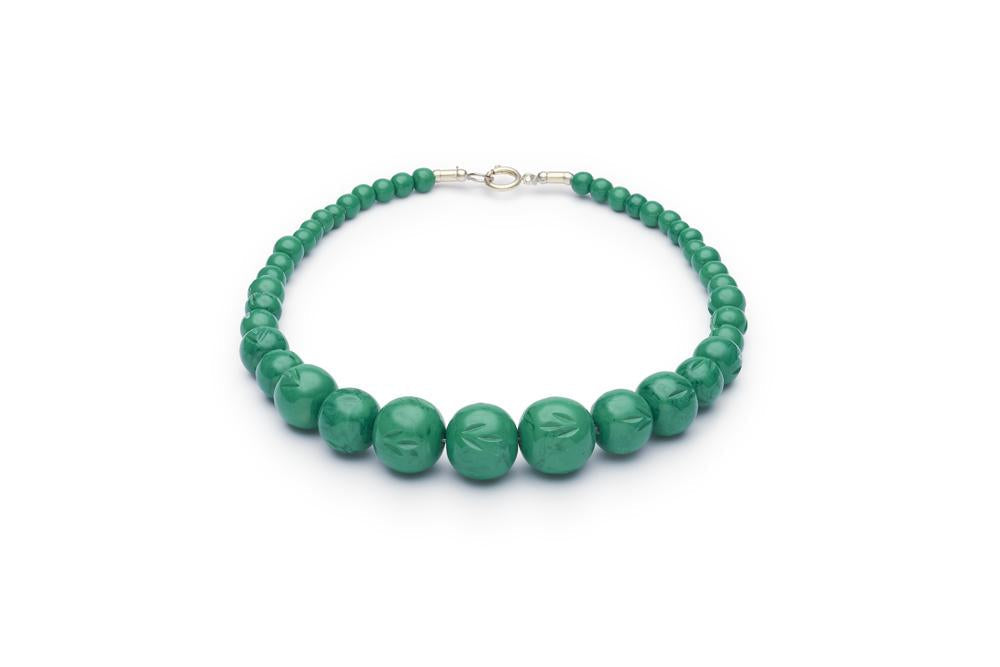 Carved Malachite Fakelite Beads