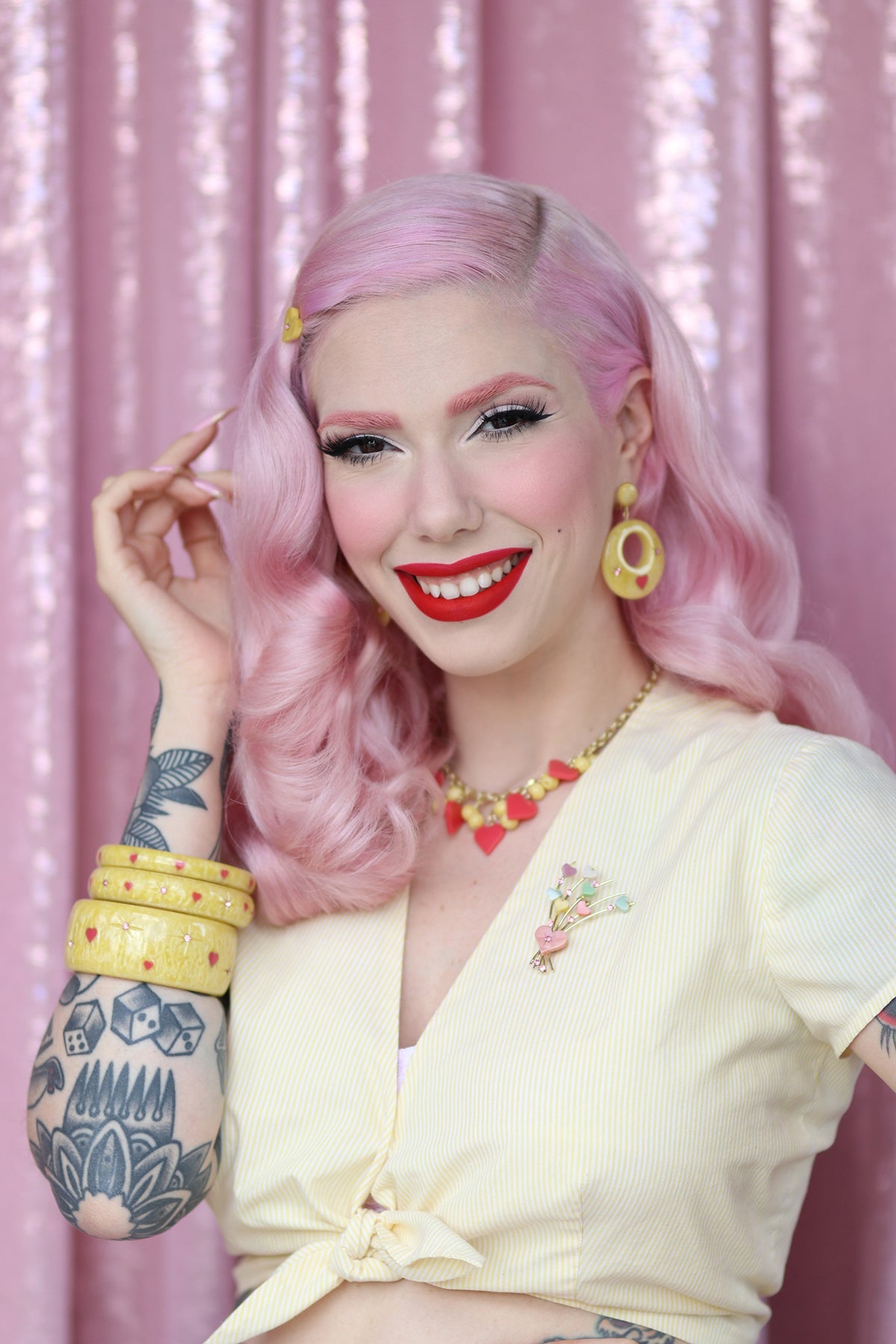 Splendette vintage inspired 1950s kitsch Valentine's style pastel yellow Honey Bunch jewellery worn by pin up model Dafna Bar-El