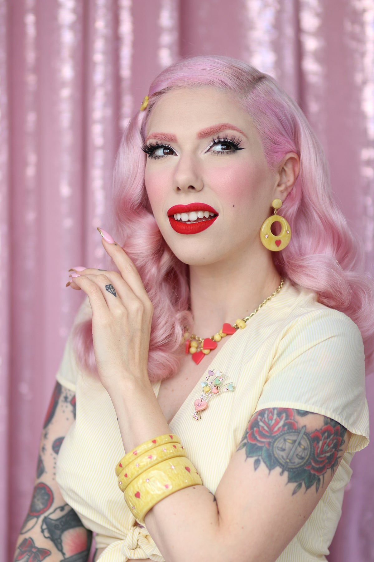 Splendette vintage inspired 1950s kitsch Valentine's style pastel yellow Honey Bunch jewellery worn by pin up model Dafna Bar-El
