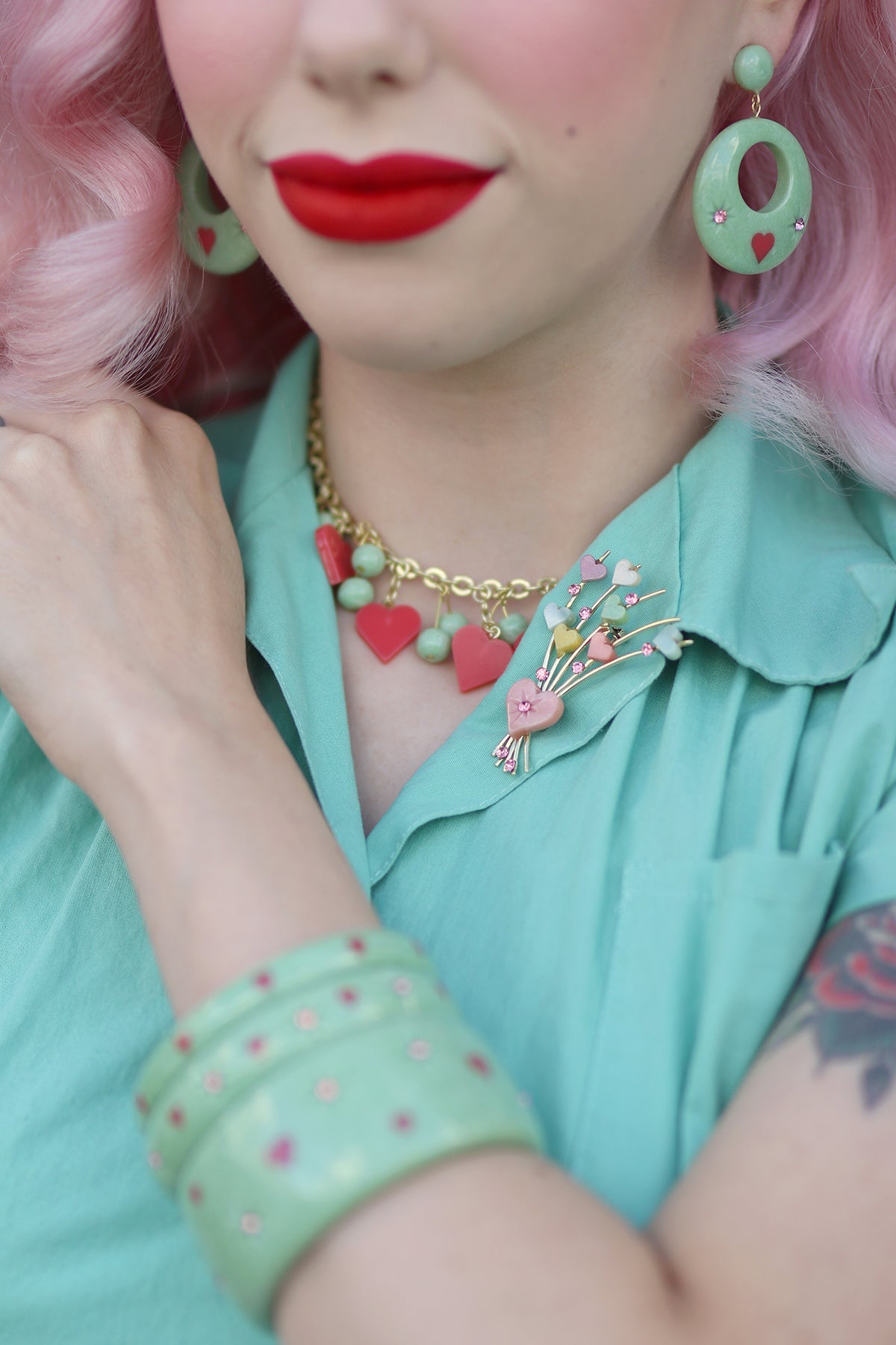 Splendette vintage inspired 1950s Valentine's style pastel green Sweet Pea fakelite jewellery worn by pin up model Dafna Bar-El