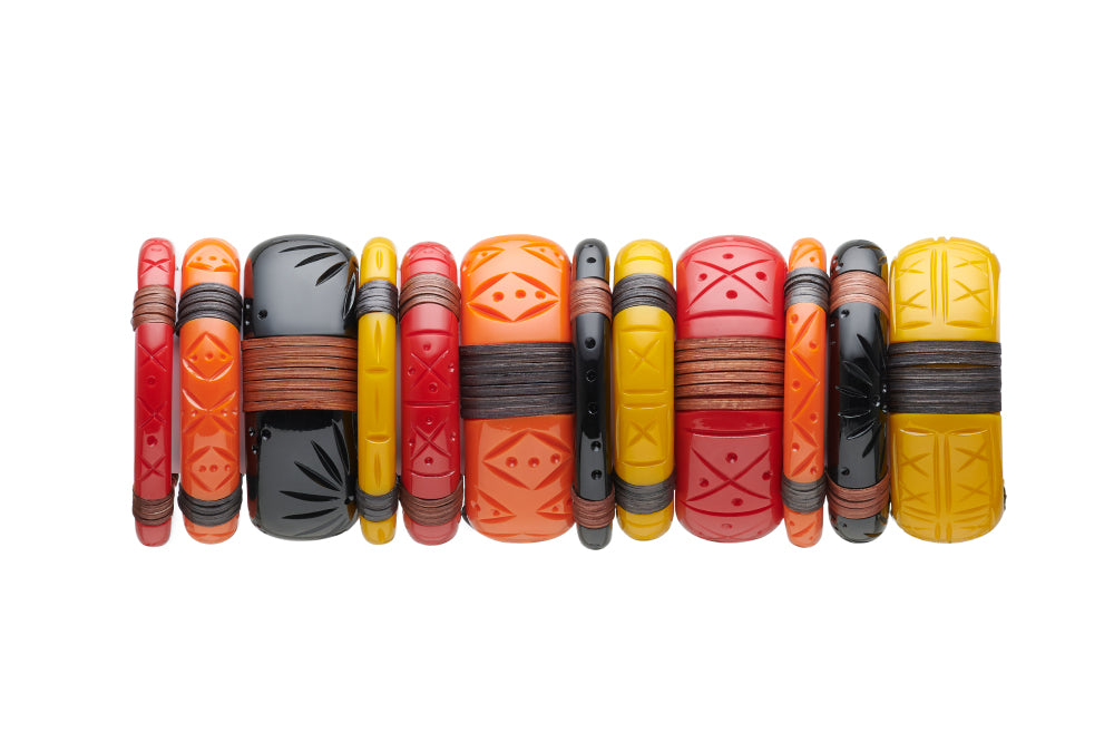 Splendette vintage inspired 1940s 1950s tropical style stack of carved fakelite bangles. Orange Tangerine, red Rosella, black Panther and yellow Ochre