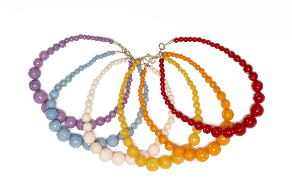 Carved Daisy White Fakelite Beads