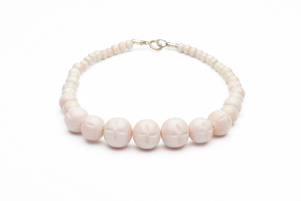 Carved Daisy White Fakelite Beads