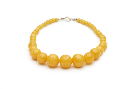 Carved Marigold Fakelite Beads