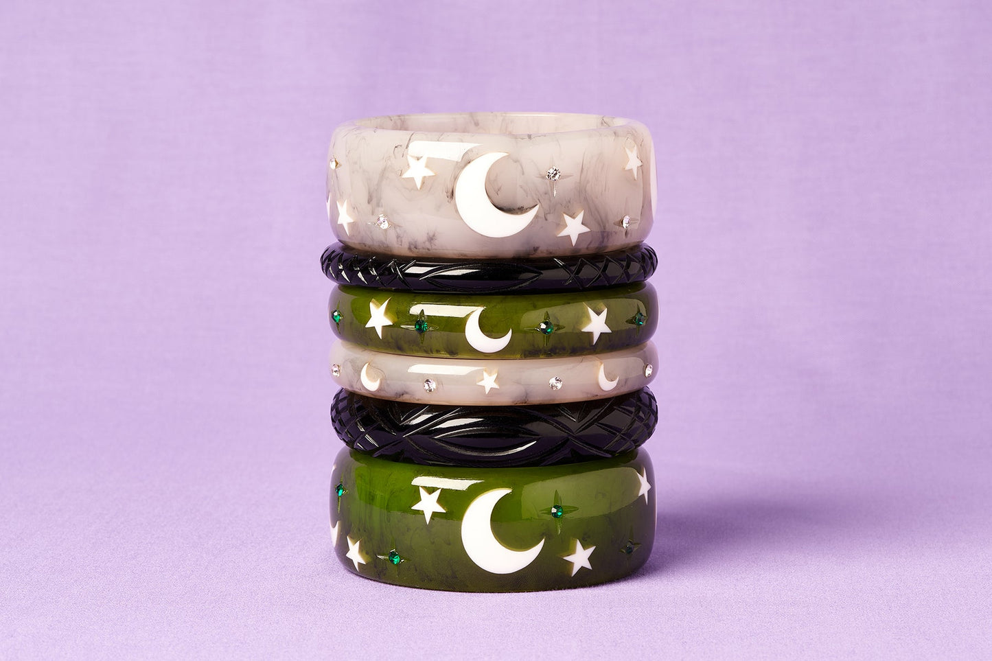 Splendette vintage inspired 1950s Halloween style green Zombie, white Spectre and Black bangles in a stack on purple background