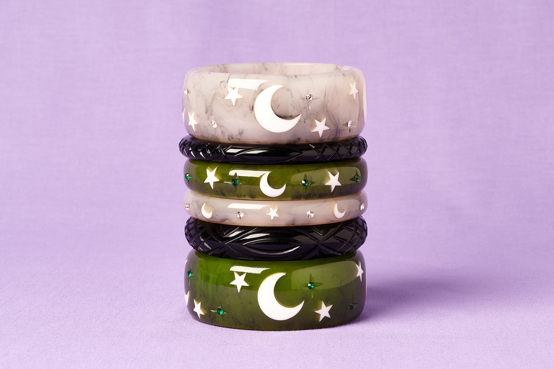 Splendette vintage inspired 1950s Halloween style green Zombie, white Spectre and Black bangles in a stack on purple background