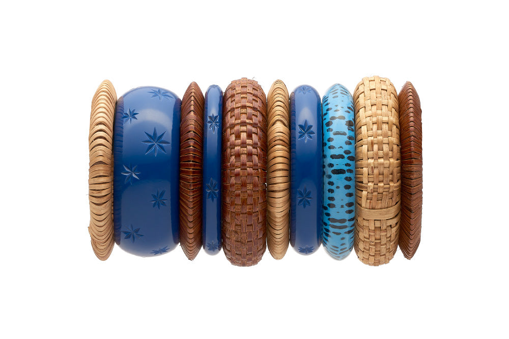 Stack of retro style bangles in twilight woven and leopard
