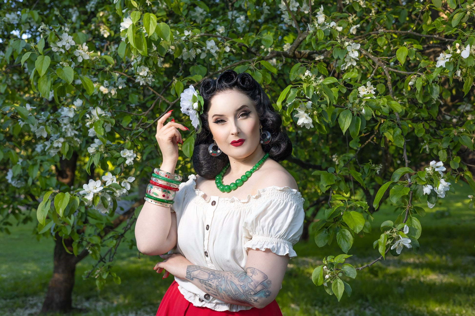 Splendette vintage inspired 1940s Bakelite style rockabilly red Cherries jewellery worn by pin up model
