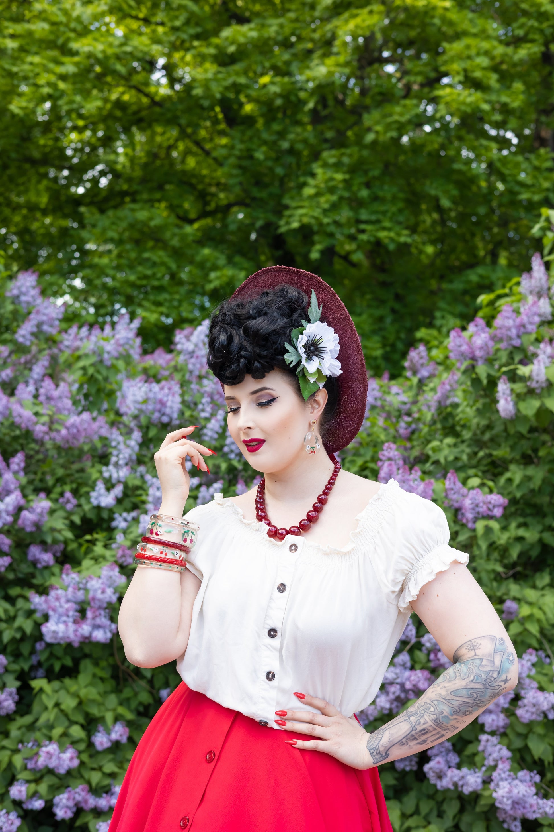 Splendette vintage inspired 1940s Bakelite style rockabilly red Cherries jewellery worn by pin up model