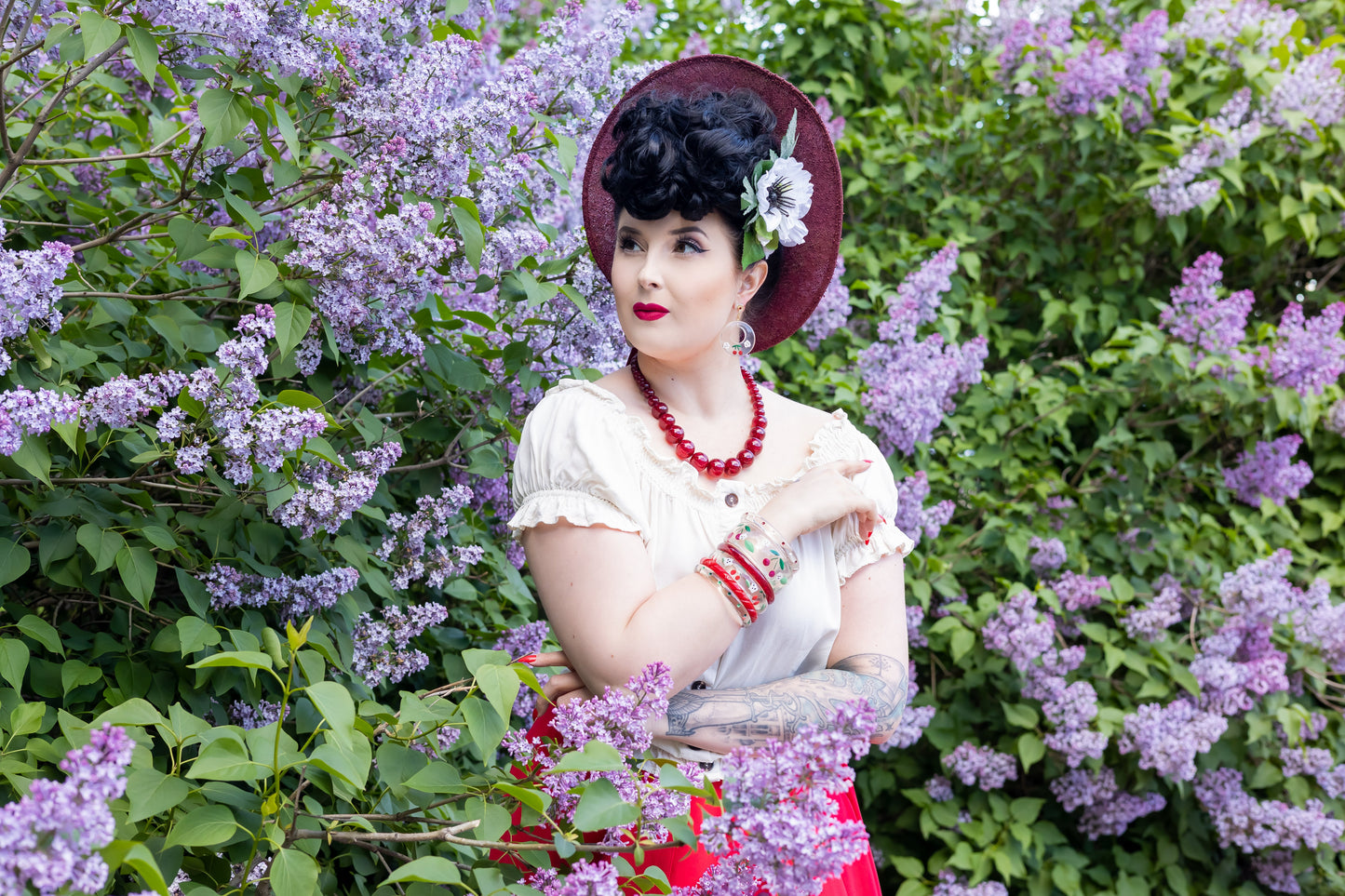 Splendette vintage inspired 1940s Bakelite style rockabilly red Cherries and green Leaves jewellery worn by pin up model