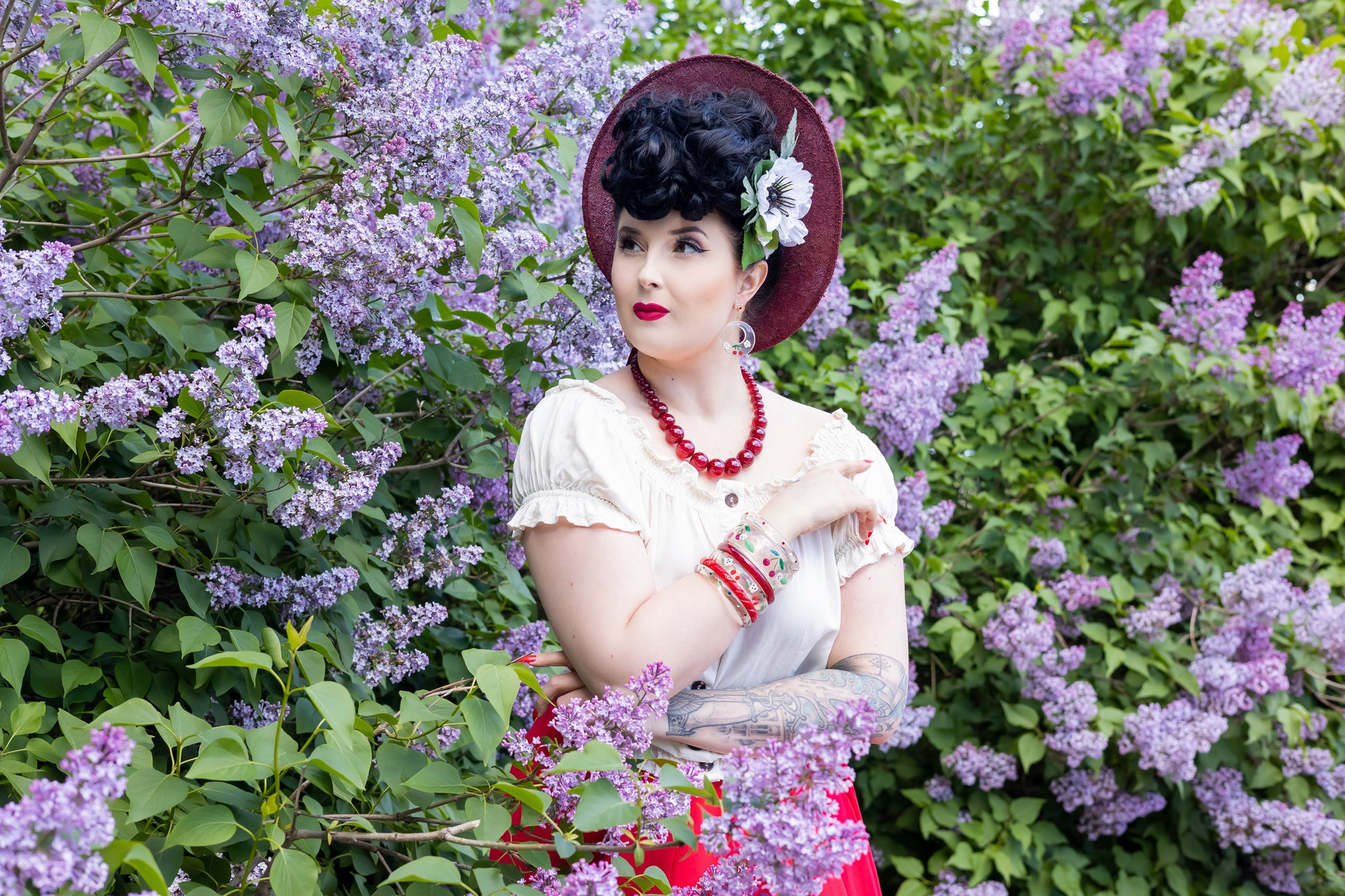 Splendette vintage inspired 1940s Bakelite style rockabilly red Cherries and green Leaves jewellery worn by pin up model