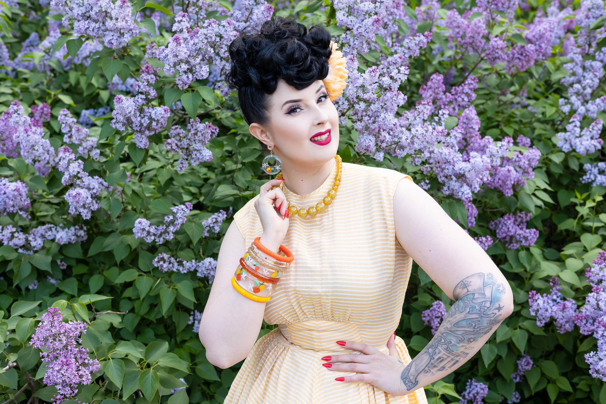 Splendette vintage inspired 1940s style orange and yellow Citrus fakelite worn by pin up model
