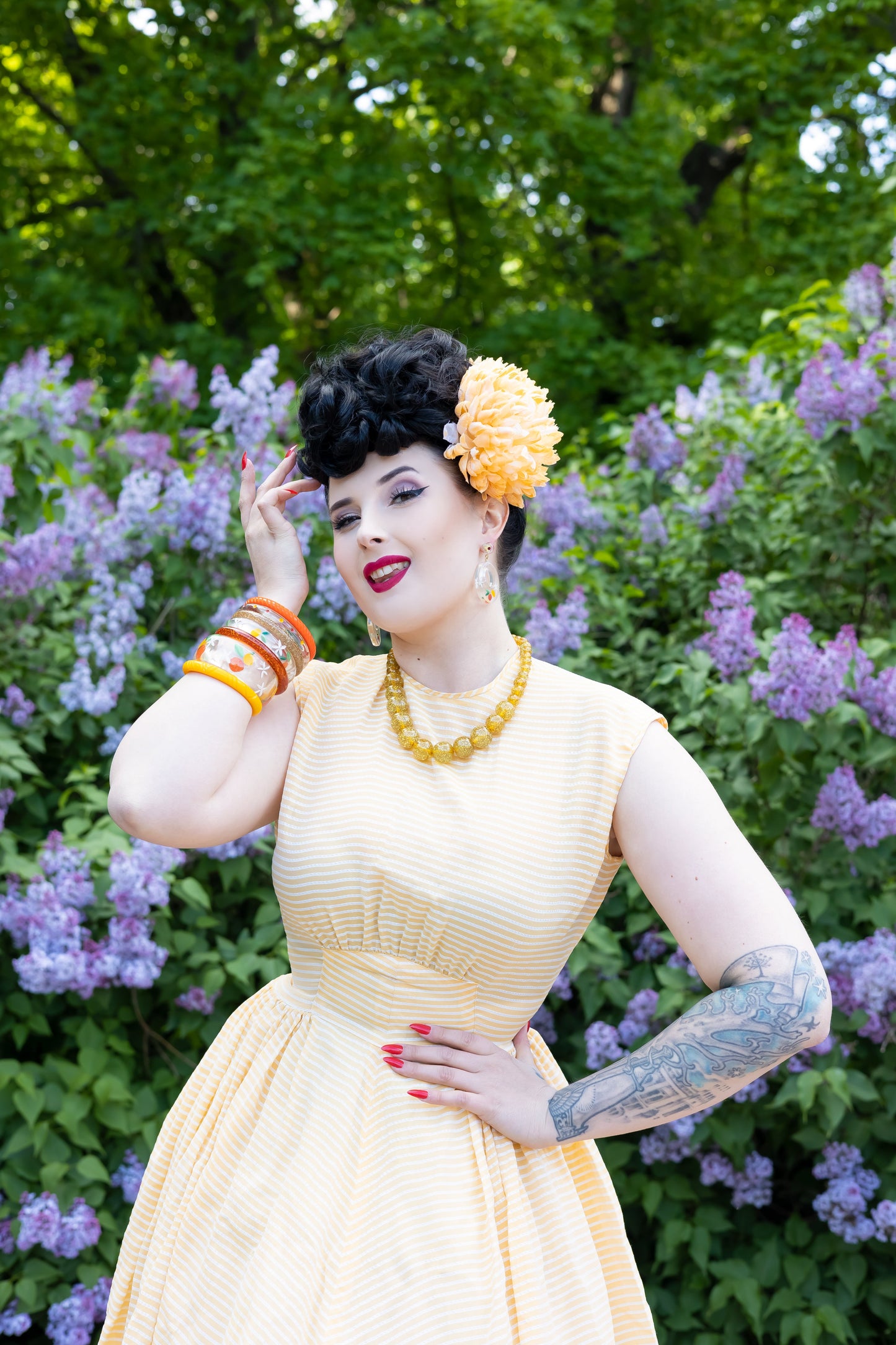Splendette vintage inspired 1940s style orange and yellow Citrus fakelite worn by pin up model