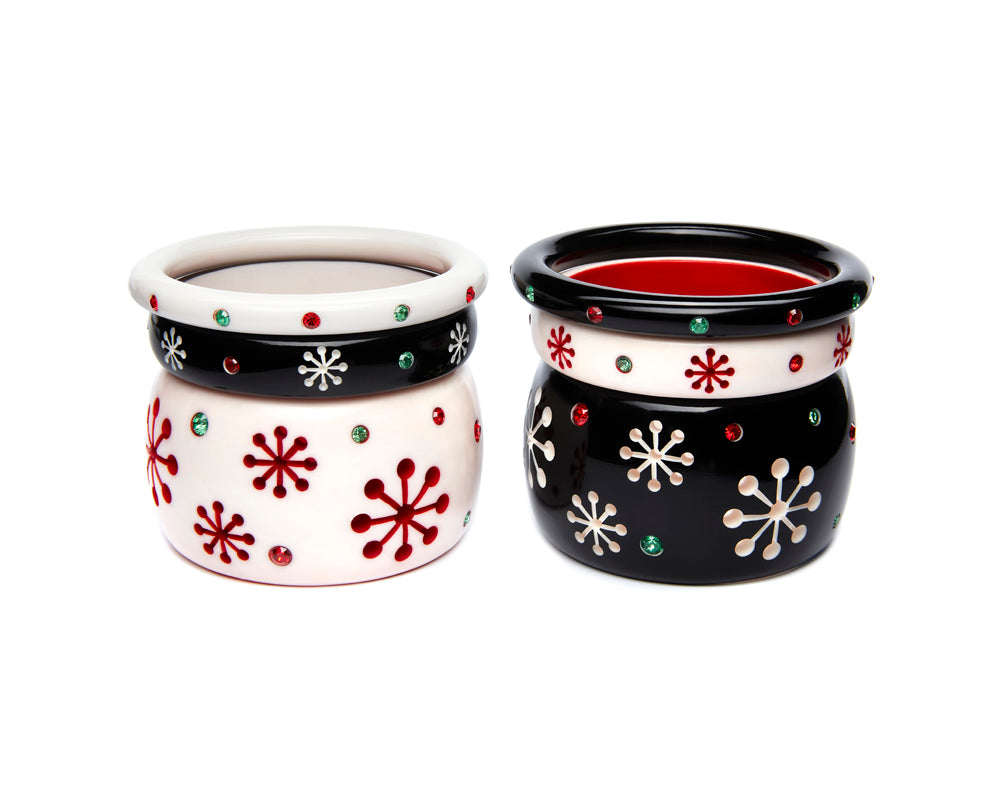 Splendette vintage inspired 1950s Christmas style Atomic Snowflake Bangle stacks with black Musta and white Lumi bangles, with red and green glitter bangle stack