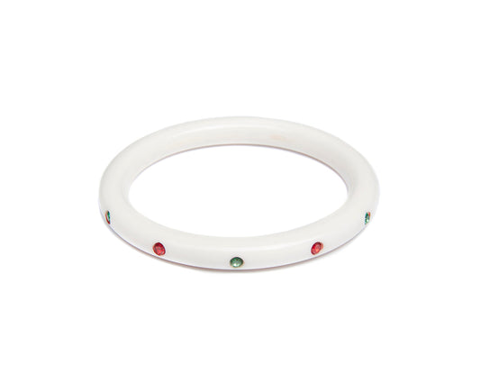 Splendette vintage inspired 1950s mid-century Christmas style white Narrow Lumi Atomic Snowflake Bangle in Classic size with red and green diamantes