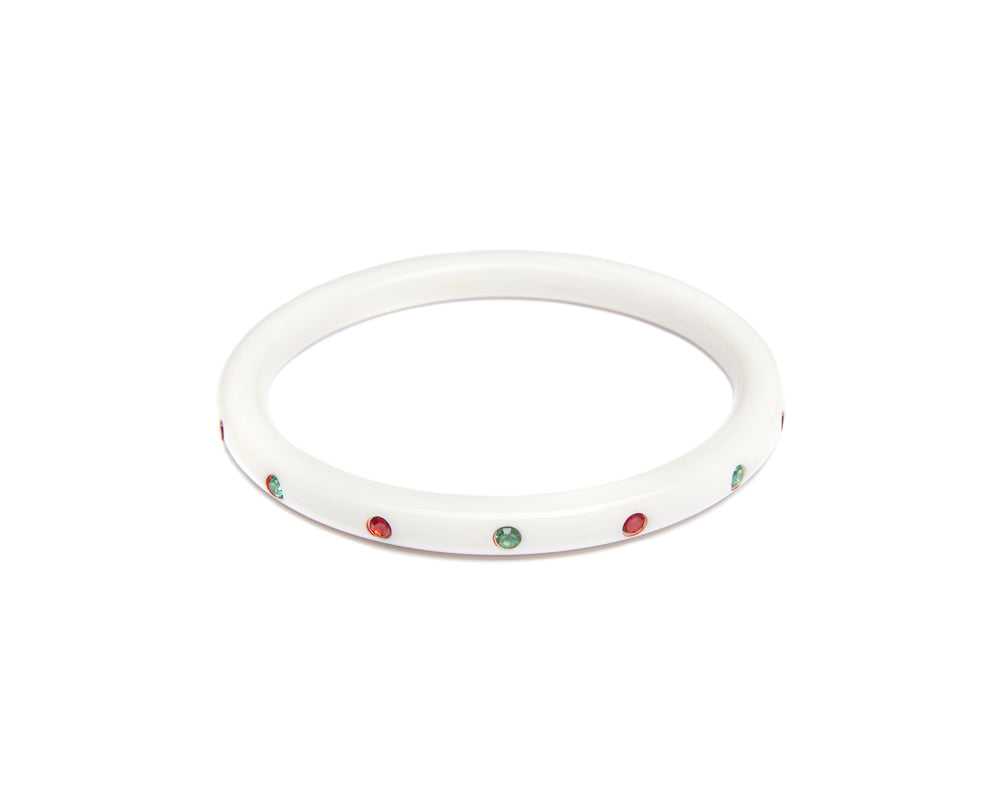 Splendette vintage inspired 1950s mid-century Christmas style white Narrow Lumi Atomic Snowflake Bangle in larger Duchess size with red and green diamantes