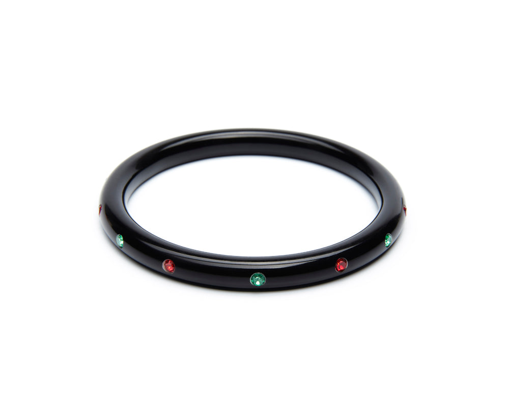 Splendette vintage inspired 1950s mid-century Christmas style black Narrow Musta Atomic Snowflake Bangle in larger Duchess size with red and green diamantes