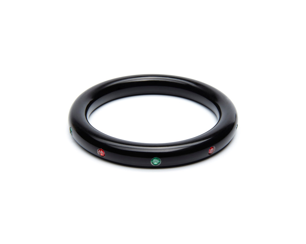Splendette vintage inspired 1950s mid-century Christmas style black Narrow Musta Atomic Snowflake Bangle in smaller Maiden size with red and green diamantes
