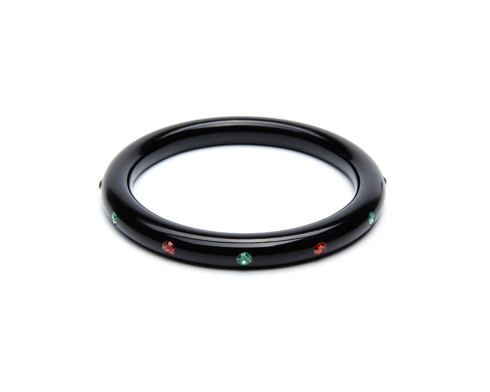 Splendette vintage inspired 1950s mid-century Christmas style black Narrow Musta Atomic Snowflake Bangle in Classic size with red and green diamantes