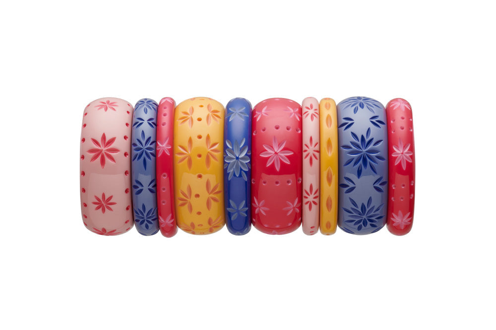 Splendette vintage inspired 1950s style carved Duotone fakelite bangle stack with pink Raspberry & Ripple, yellow Honeysuckle, and blue Cornflower & Forget-Me-Not