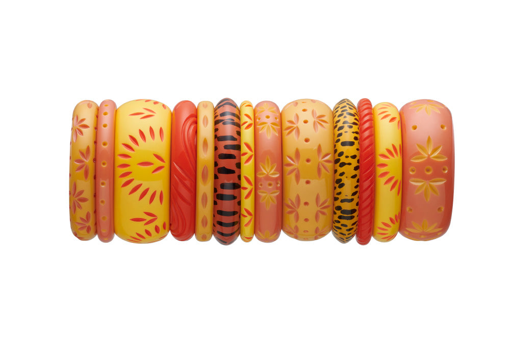 Splendette vintage inspired 1950s pin up rockabilly style yellow and orange carved fakelite bangle stack with Honeysuckle, Freesia, Sunrise, Papaya, yellow and orange leopard print