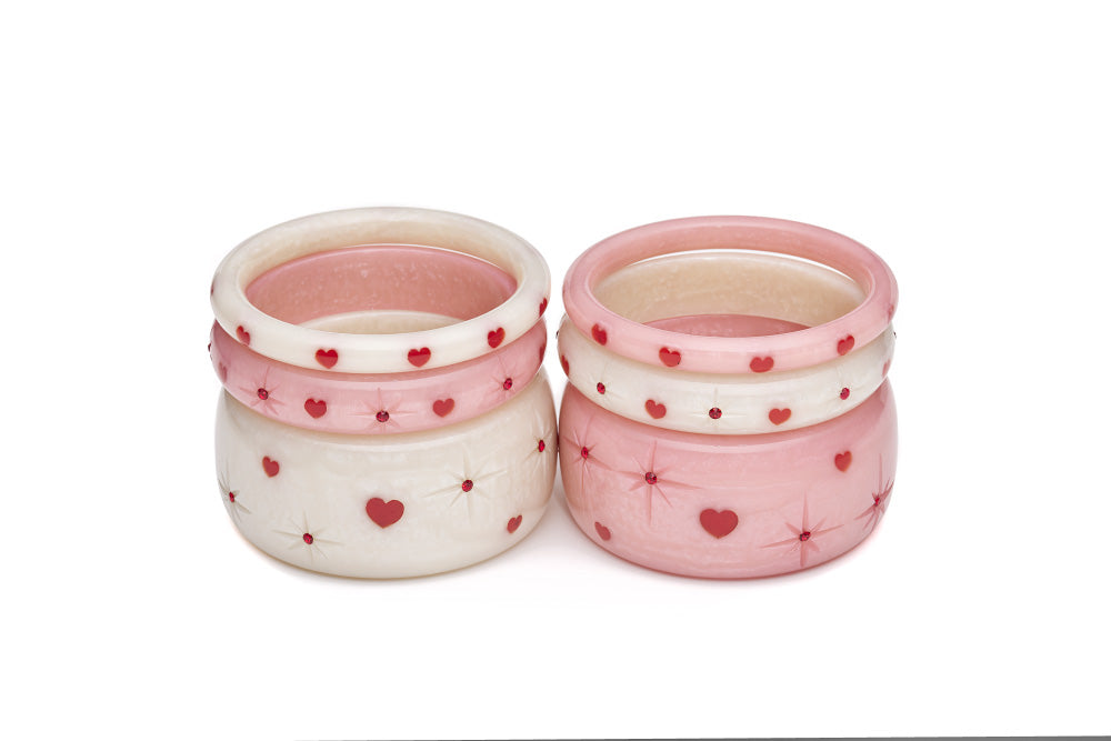 Splendette vintage inspired 1950s style Valentine's pink Sweetheart Starburst Bangles and white Secret Admirer Starburst Bangles in two stacks