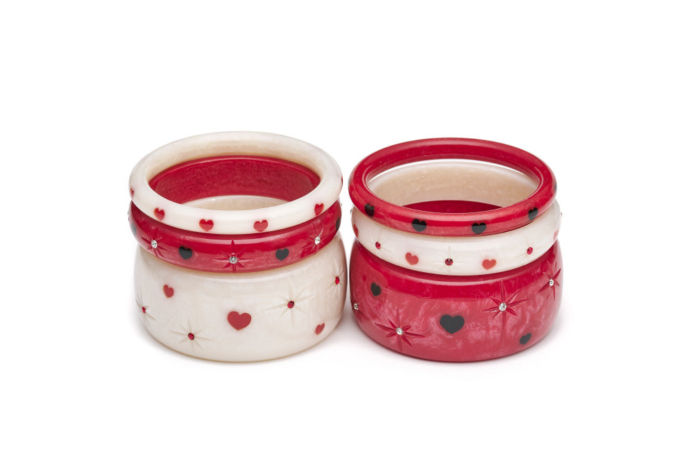 Splendette vintage inspired 1950s Valentine's style red Heartthrob Starburst Bangles with white Secret Admirer Starburst Bangles in two stacks