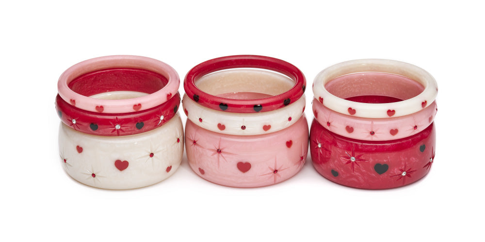 Splendette vintage inspired 1950s style Valentine's white Secret Admirer Starburst Bangles, pink Sweetheart Starburst Bangles and red Heartthrob Starburst Bangles in three stacks