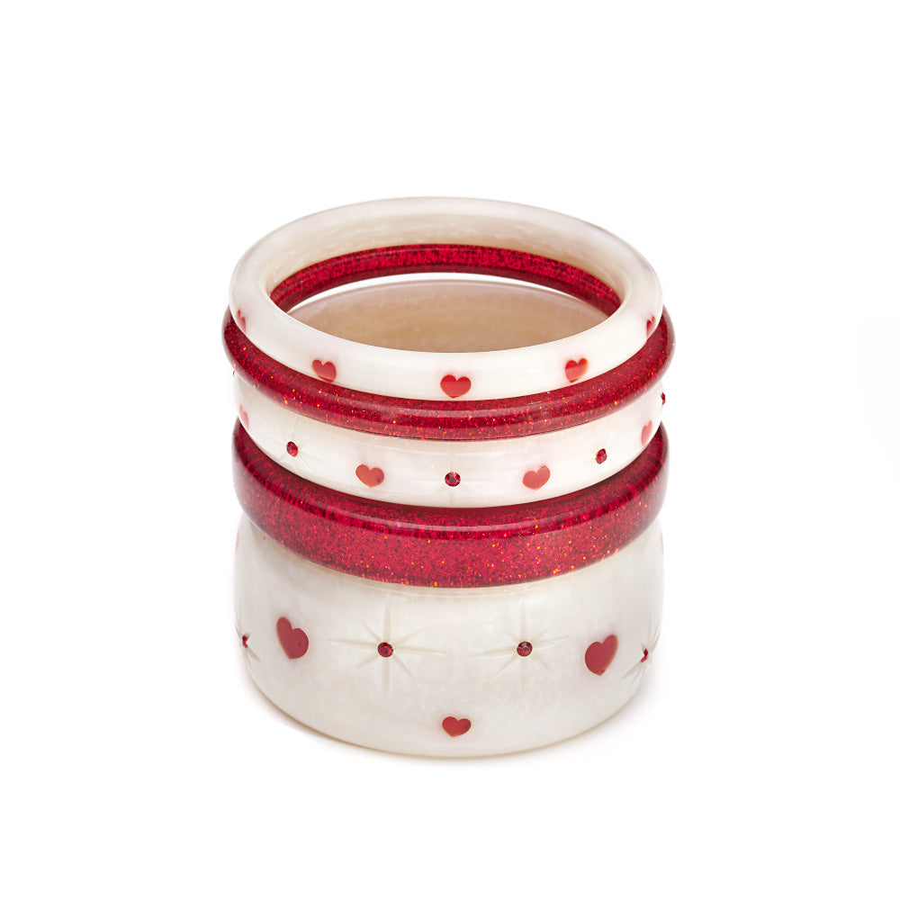 Splendette vintage inspired 1950s style Valentine's white Secret Admirer Starburst Bangles and Red Glitter Bangles in a stack