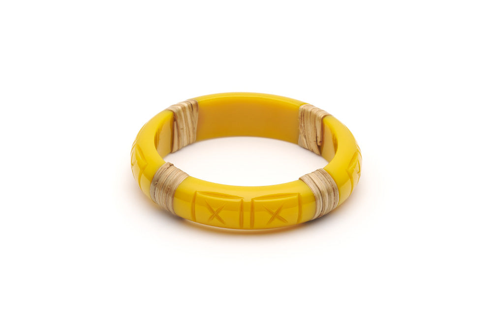 Splendette vintage inspired 1940s 1950s tropical style carved yellow fakelite Midi Ochre Light Cane Bangle in Classic size.