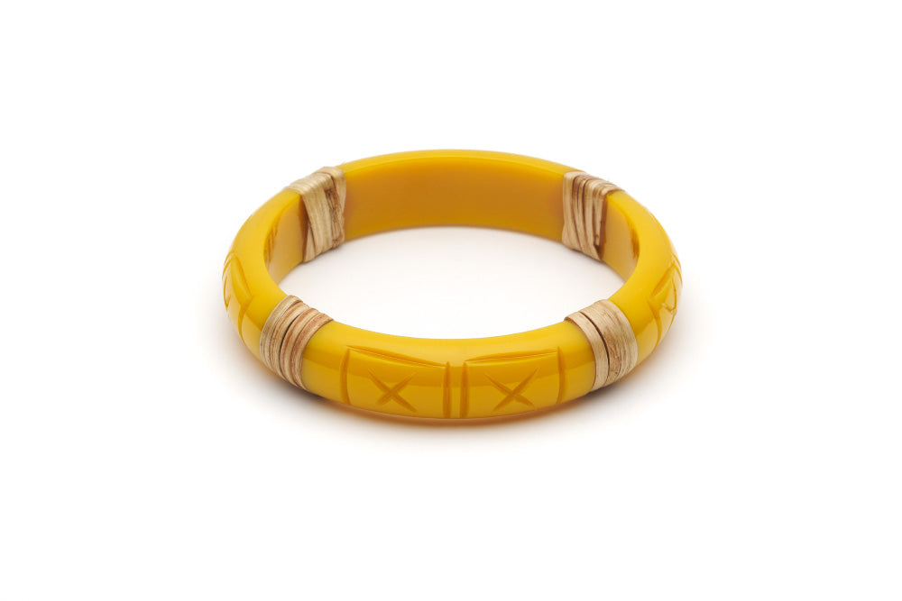 Splendette vintage inspired 1940s 1950s tropical style carved yellow fakelite Midi Ochre Light Cane Bangle in larger Duchess size.