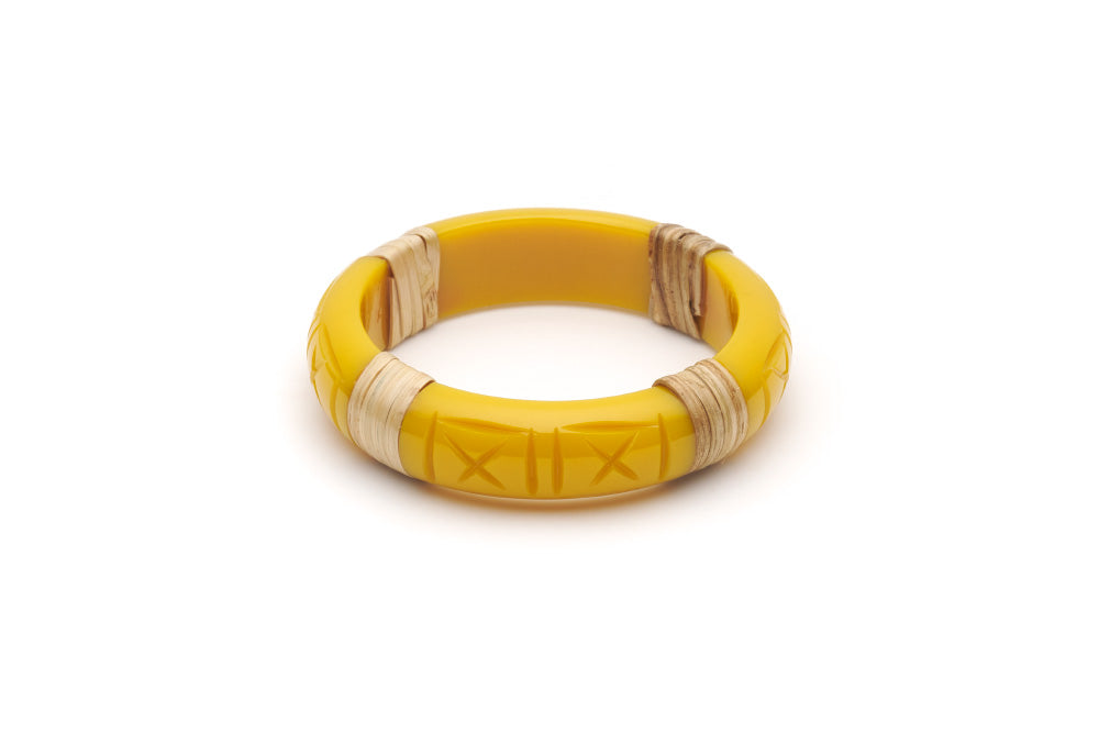Splendette vintage inspired 1940s 1950s tropical style carved yellow fakelite Midi Ochre Light Cane Bangle in smaller Maiden size.