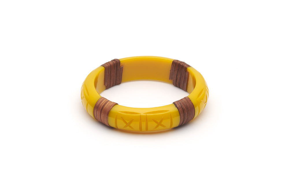 Splendette vintage inspired 1940s 1950s tropical style carved yellow fakelite Midi Ochre Mid Cane Bangle in smaller Maiden size.