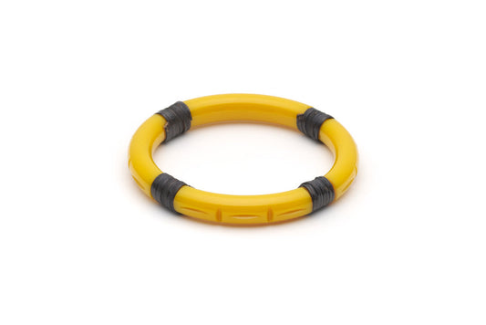 Splendette vintage inspired 1940s 1950s tropical style carved yellow fakelite Narrow Ochre Dark Cane Bangle in Classic size.