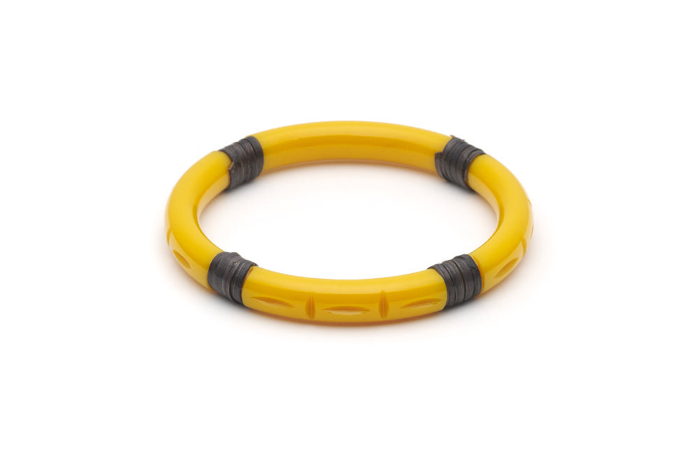 Splendette vintage inspired 1940s 1950s tropical style carved yellow fakelite Narrow Ochre Dark Cane Bangle in larger Duchess size.