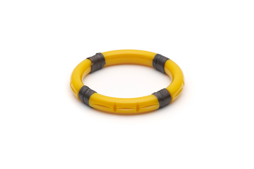 Splendette vintage inspired 1940s 1950s tropical style carved yellow fakelite Narrow Ochre Dark Cane Bangle in smaller Maiden size.