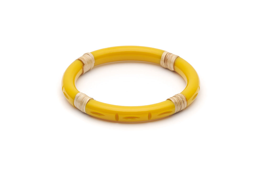 Splendette vintage inspired 1940s 1950s tropical style carved yellow fakelite Narrow Ochre Light Cane Bangle in larger Duchess size.