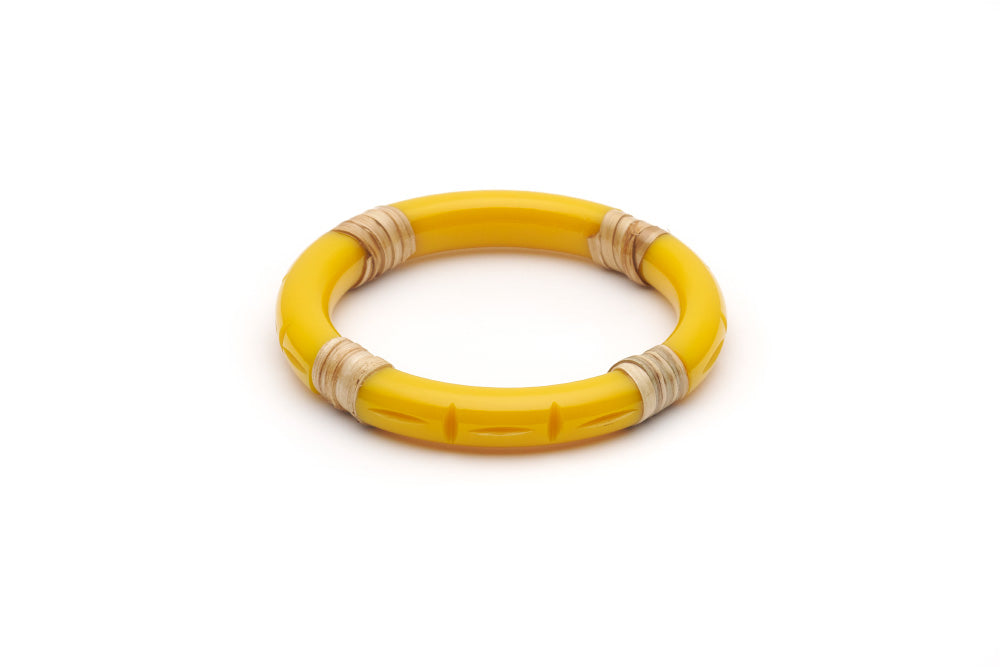 Splendette vintage inspired 1940s 1950s tropical style carved yellow fakelite Narrow Ochre Light Cane Bangle in smaller Maiden size.