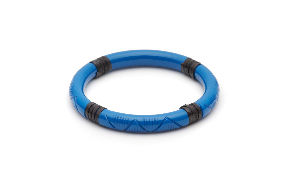 Splendette vintage inspired 1940s 1950s holiday vacation style carved blue fakelite Narrow Pacific Dark Cane Bangle in larger Duchess size.