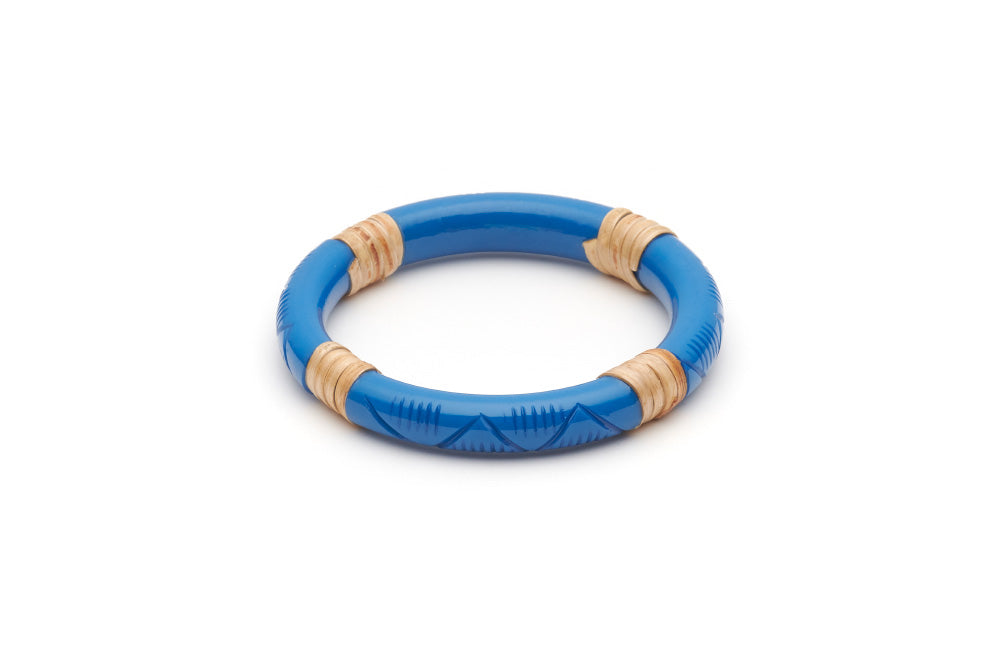Splendette vintage inspired 1940s 1950s holiday vacation style carved blue fakelite Narrow Pacific Light Cane Bangle in smaller Maiden size.